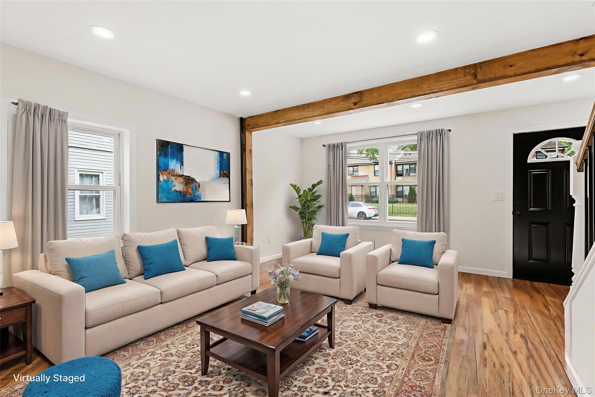31 Grove Street Hempstead, NY 11550 - Photo 2 of 17 a living room with furniture and wooden floor