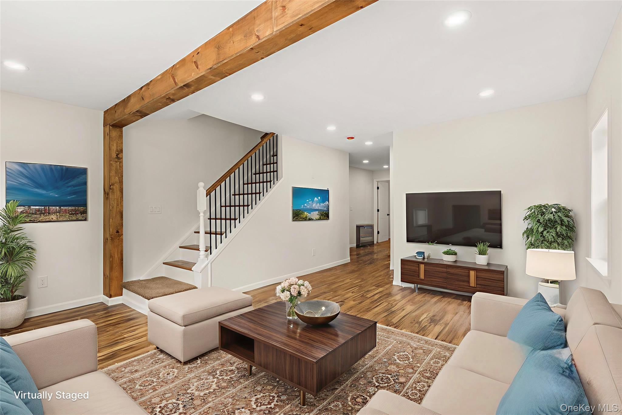 31 Grove Street Hempstead, NY 11550 - Photo 4 of 17 a living room with furniture and a flat screen tv