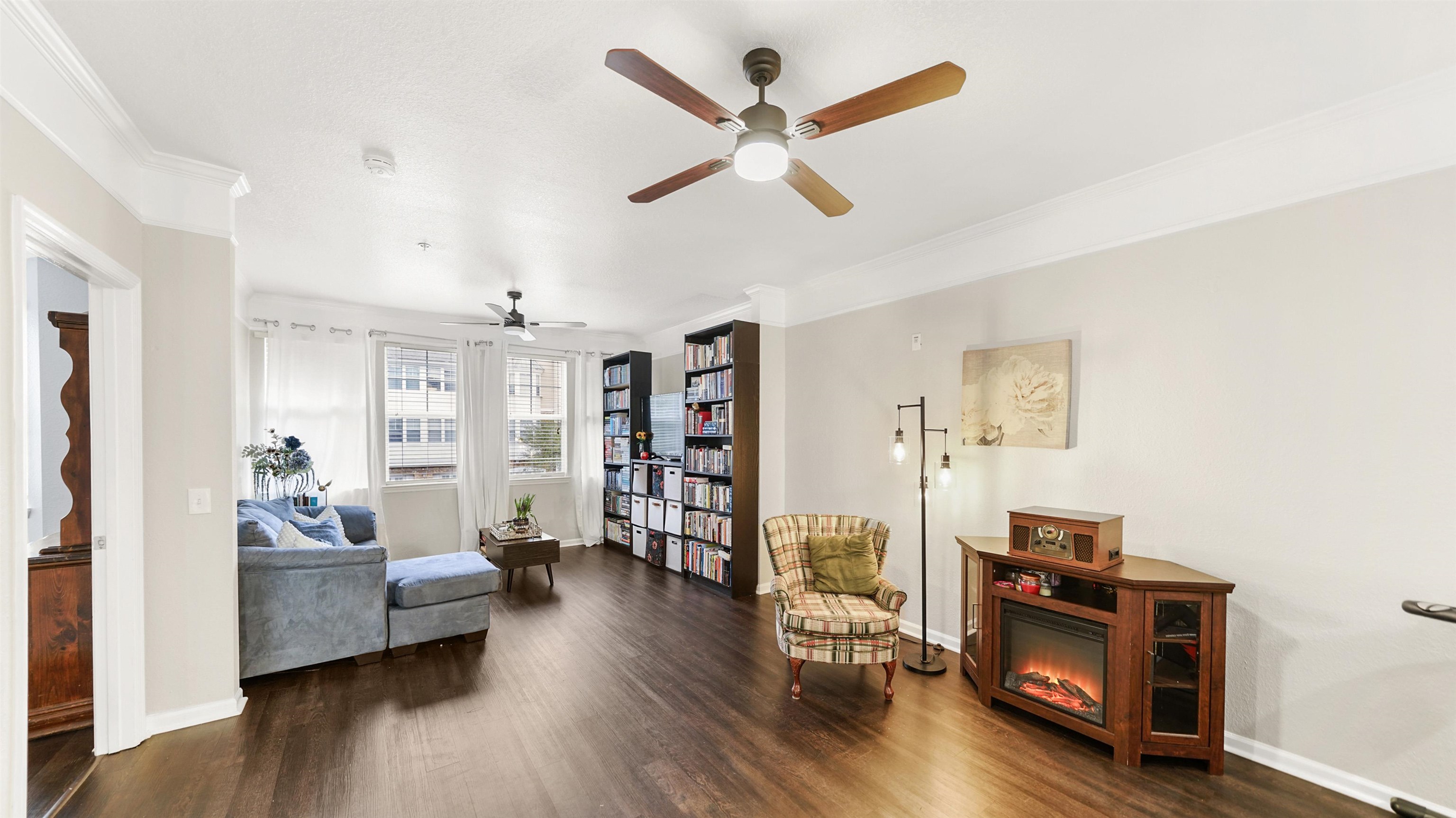 8550 Touchton Road, Unit 625 Jacksonville, FL 32216 - Photo 12 of 47 a living room with furniture and a wooden floor