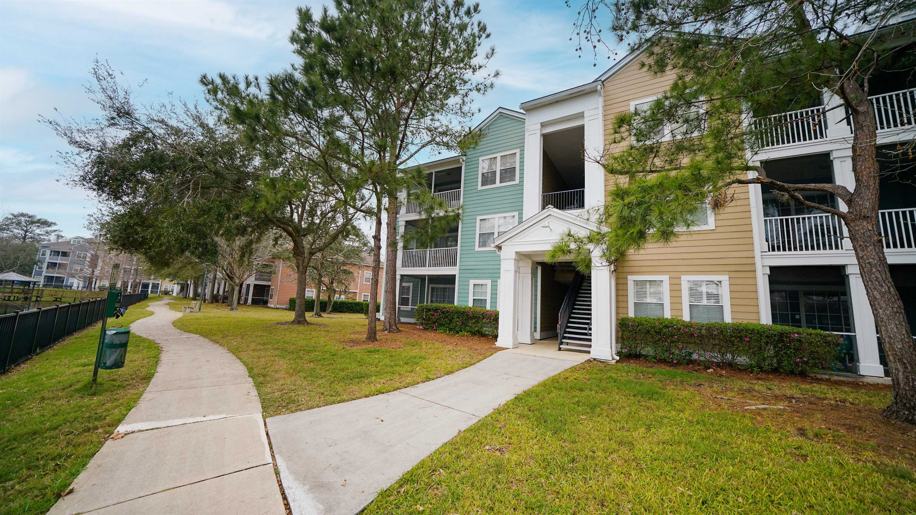 8550 Touchton Road, Unit 625 Jacksonville, FL 32216 - Photo 20 of 47 front view of a house with a yard