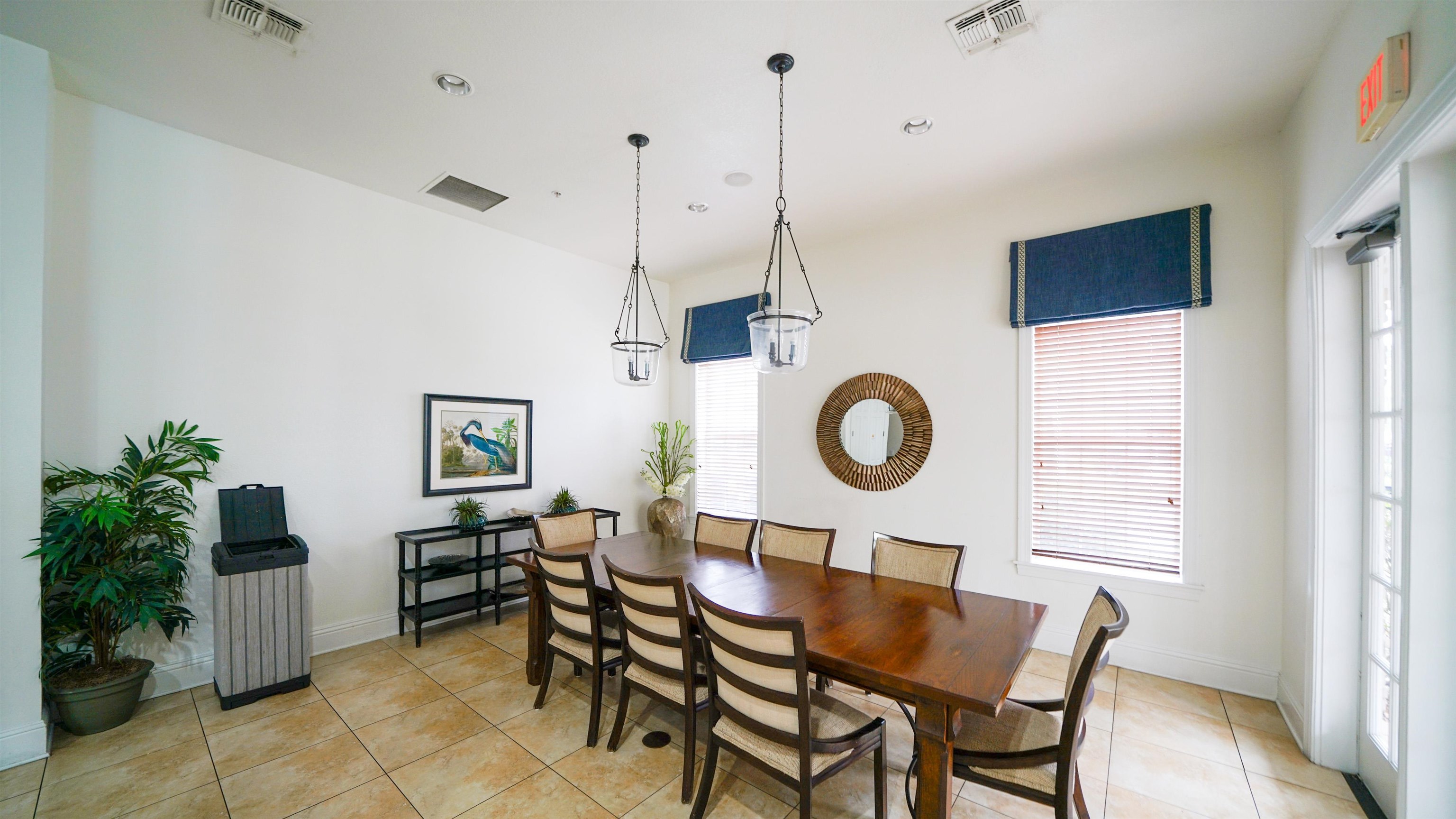 8550 Touchton Road, Unit 625 Jacksonville, FL 32216 - Photo 30 of 47 a view of a dining room with furniture and a chandelier