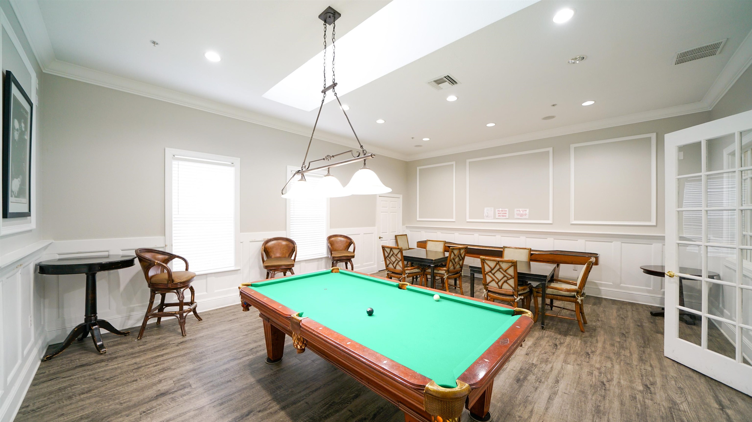 8550 Touchton Road, Unit 625 Jacksonville, FL 32216 - Photo 32 of 47 a room with furniture pool table gym equipment wooden floor and window