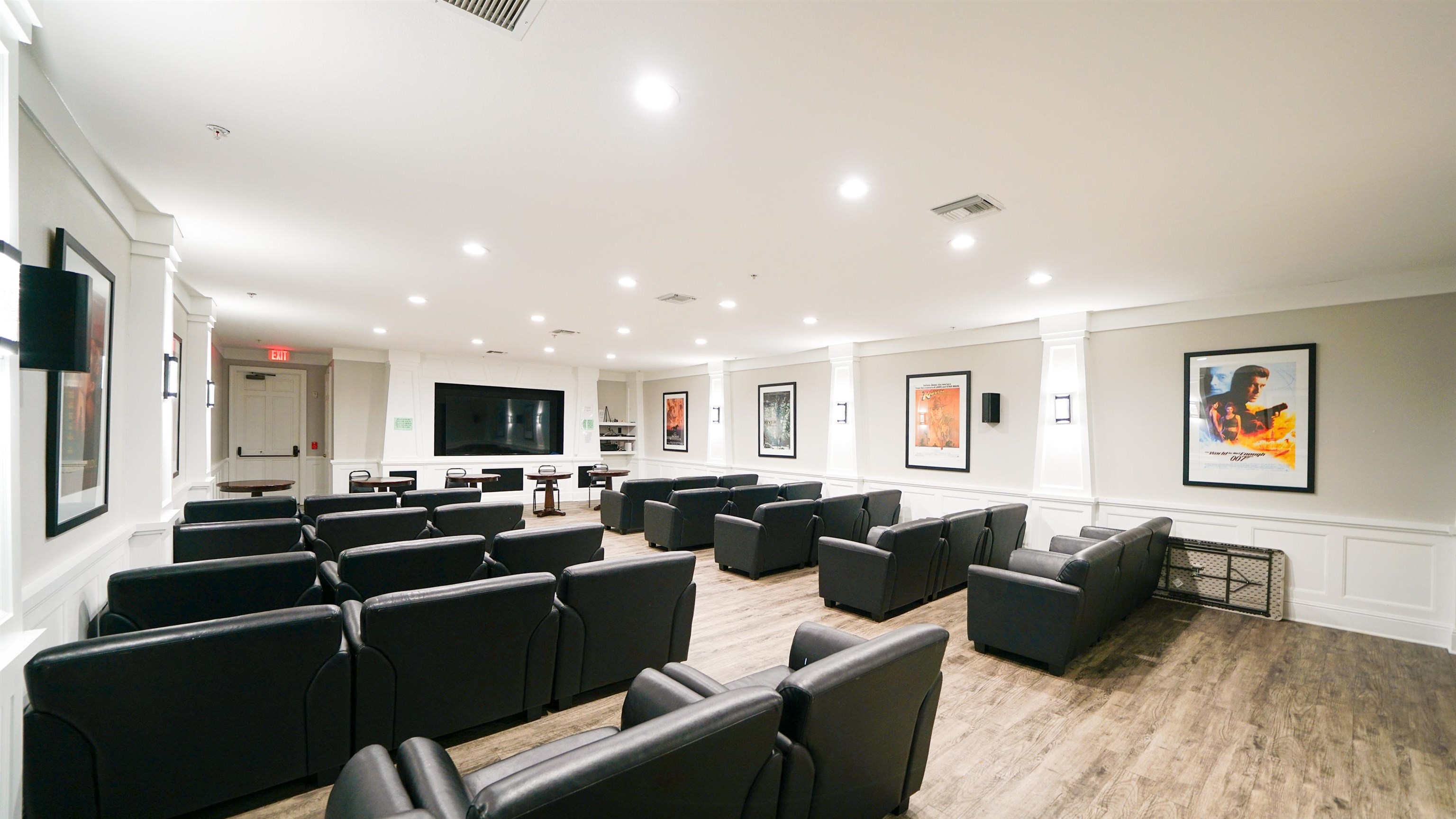 8550 Touchton Road, Unit 625 Jacksonville, FL 32216 - Photo 34 of 47 a living room with furniture a flat screen tv and kitchen view