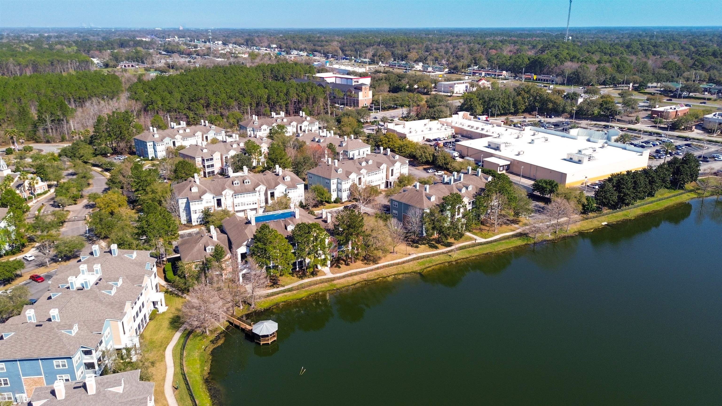 8550 Touchton Road, Unit 625 Jacksonville, FL 32216 - Photo 45 of 47 an aerial view of residential houses with outdoor space and swimming pool