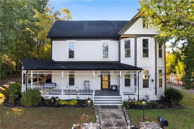 front view of a house with a swimming pool