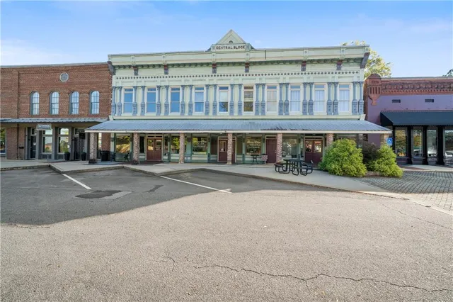 a view of a building with a street