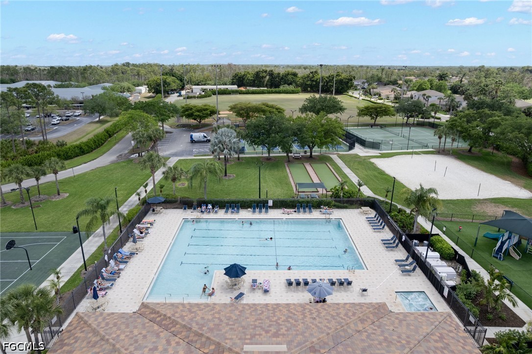 21711 Brixham Run Loop Estero, FL 33928 - Photo 23 of 32 an aerial view of a tennis court