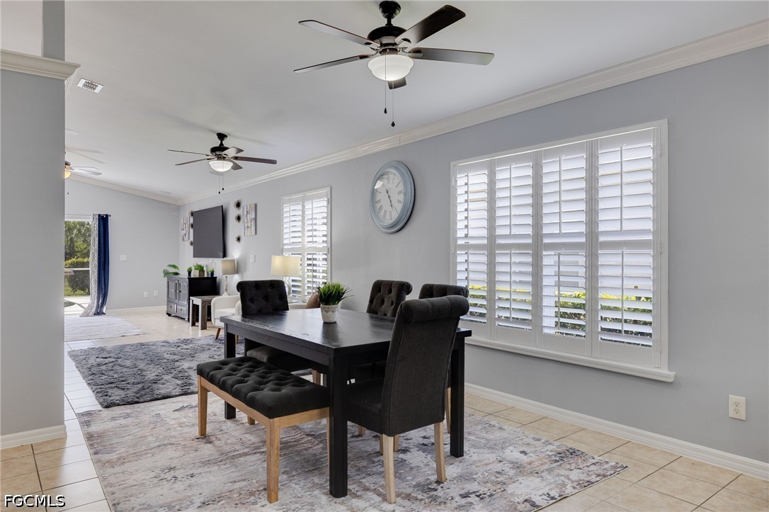 21711 Brixham Run Loop Estero, FL 33928 - Photo 6 of 32 a view of a dining room with furniture