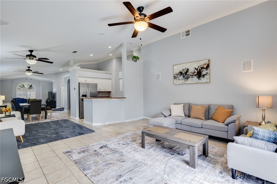 21711 Brixham Run Loop Estero, FL 33928 - Photo 10 of 32 a living room with furniture and a rug