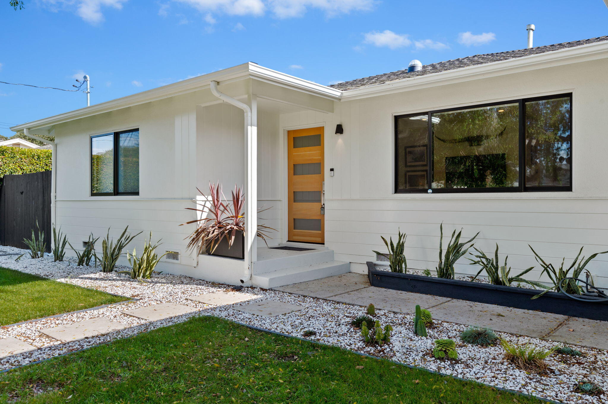 308 Cooper Road Santa Barbara, CA 93109 - Photo 12 of 41 a front view of a house with garden