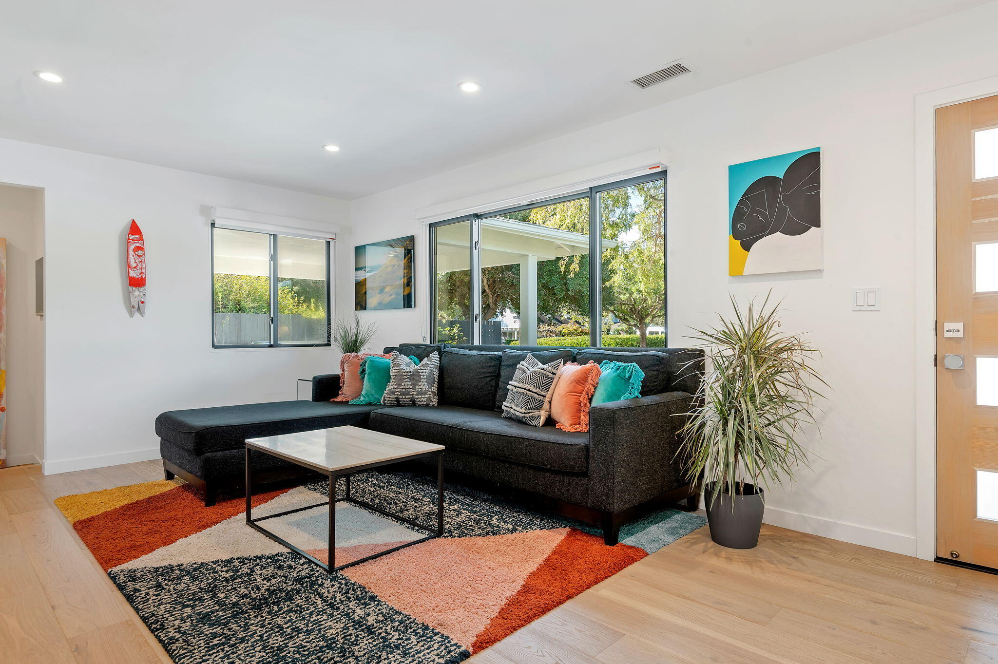 308 Cooper Road Santa Barbara, CA 93109 - Photo 13 of 41 a living room with furniture and wooden floor
