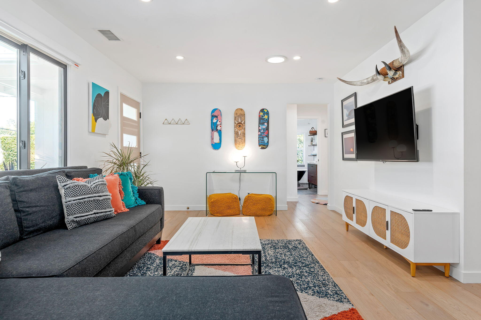 308 Cooper Road Santa Barbara, CA 93109 - Photo 15 of 41 a living room with furniture and a flat screen tv