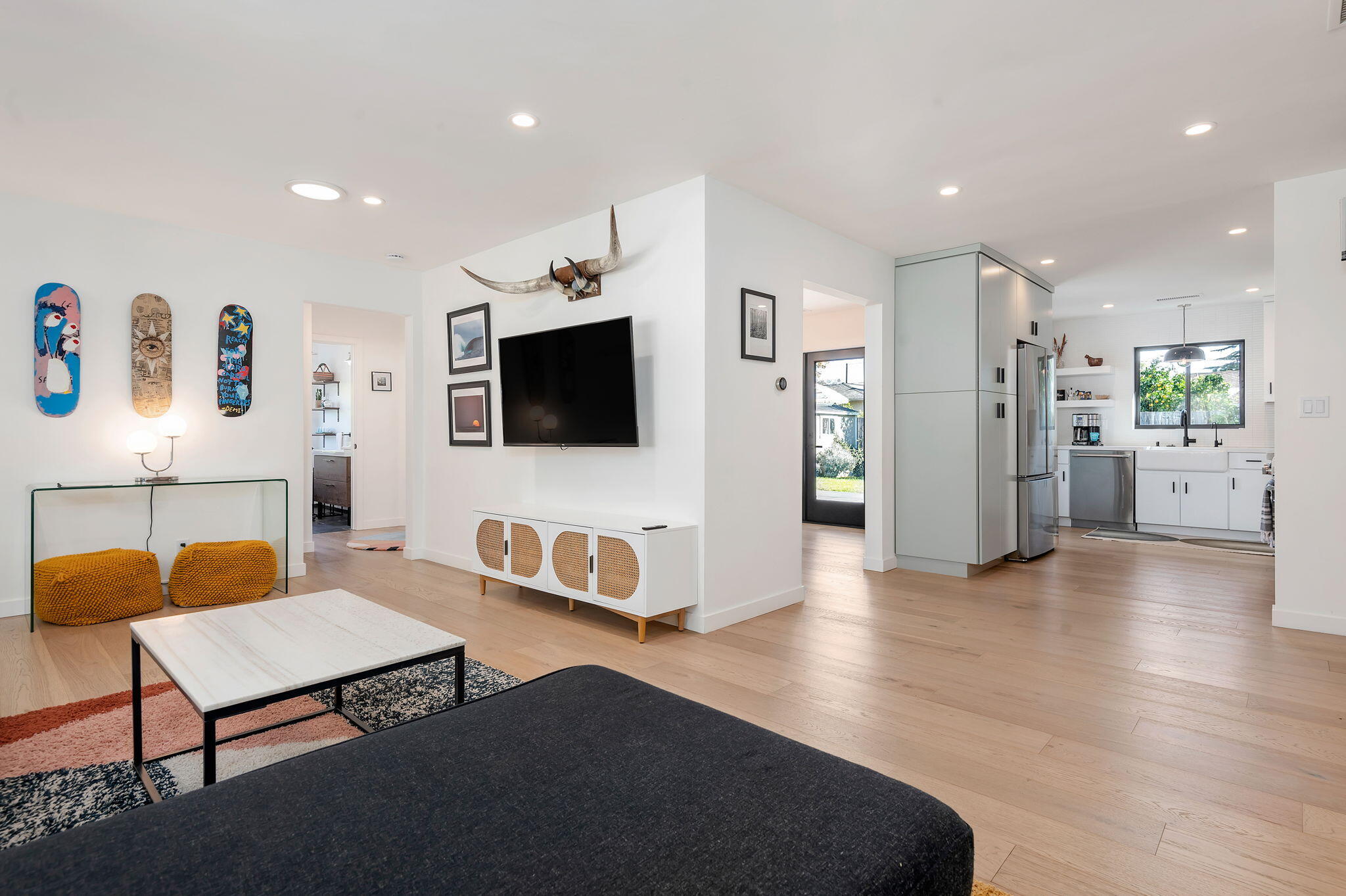 308 Cooper Road Santa Barbara, CA 93109 - Photo 16 of 41 a living room with furniture and a flat screen tv
