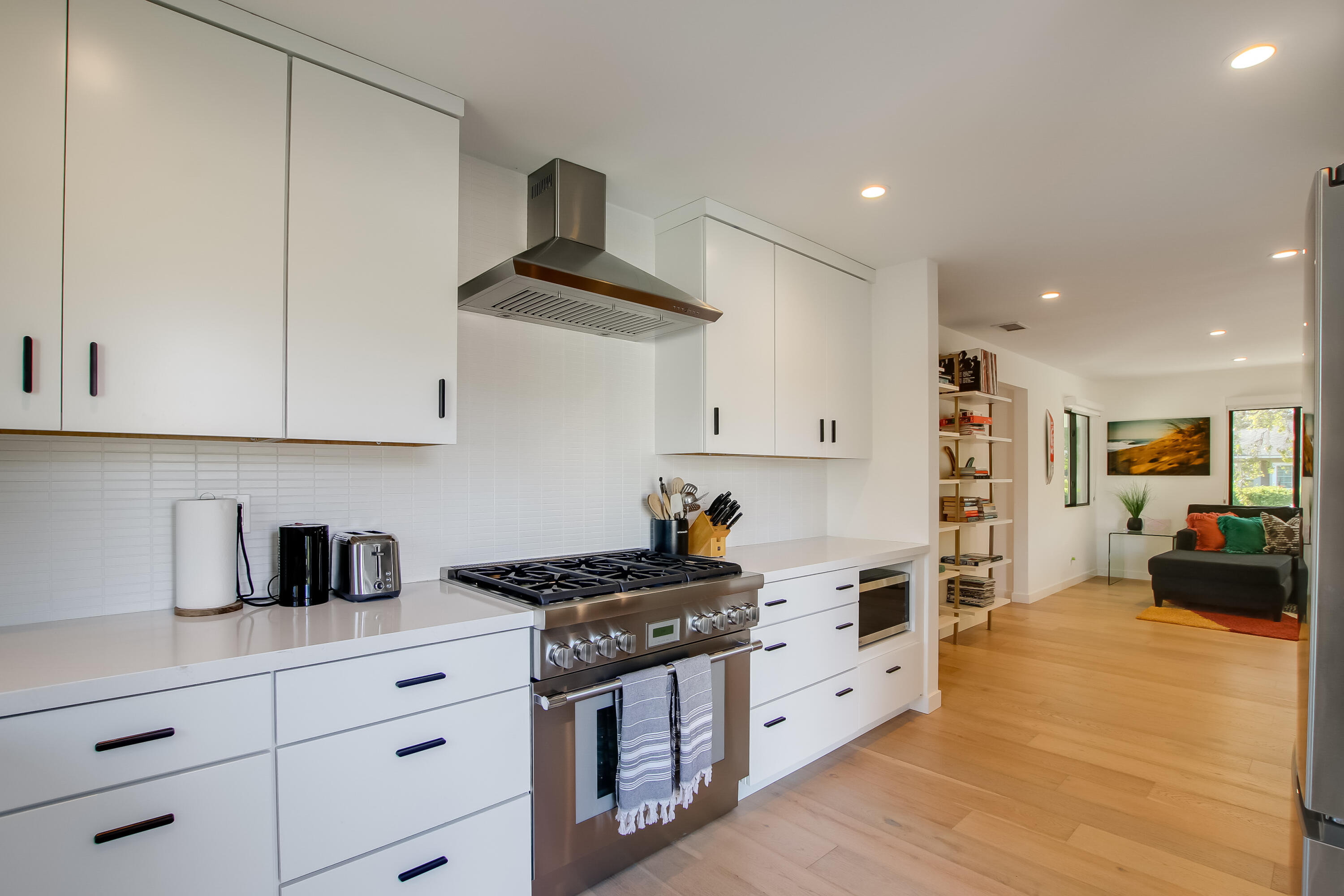 308 Cooper Road Santa Barbara, CA 93109 - Photo 19 of 41 a kitchen with stainless steel appliances a white stove top oven and cabinets