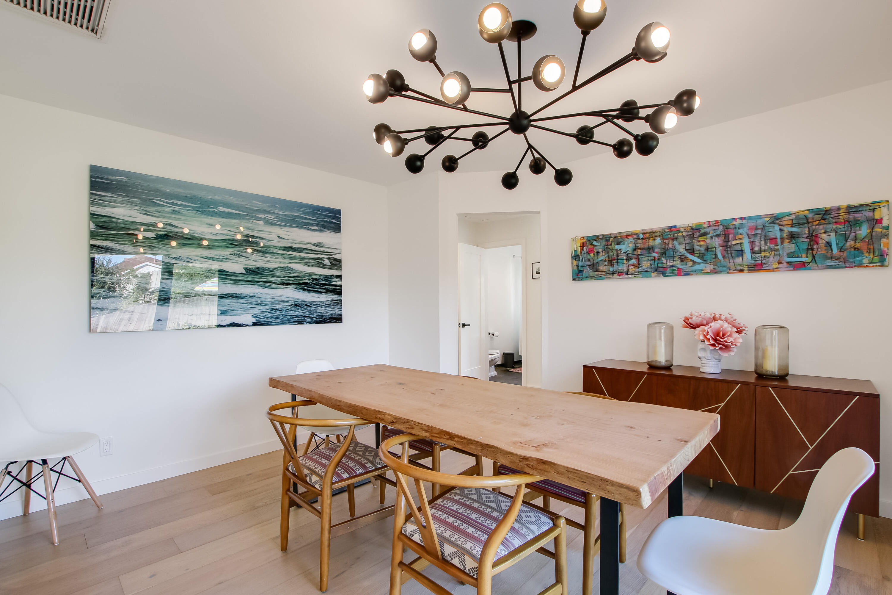 308 Cooper Road Santa Barbara, CA 93109 - Photo 20 of 41 a view of a dining room with furniture and wooden floor