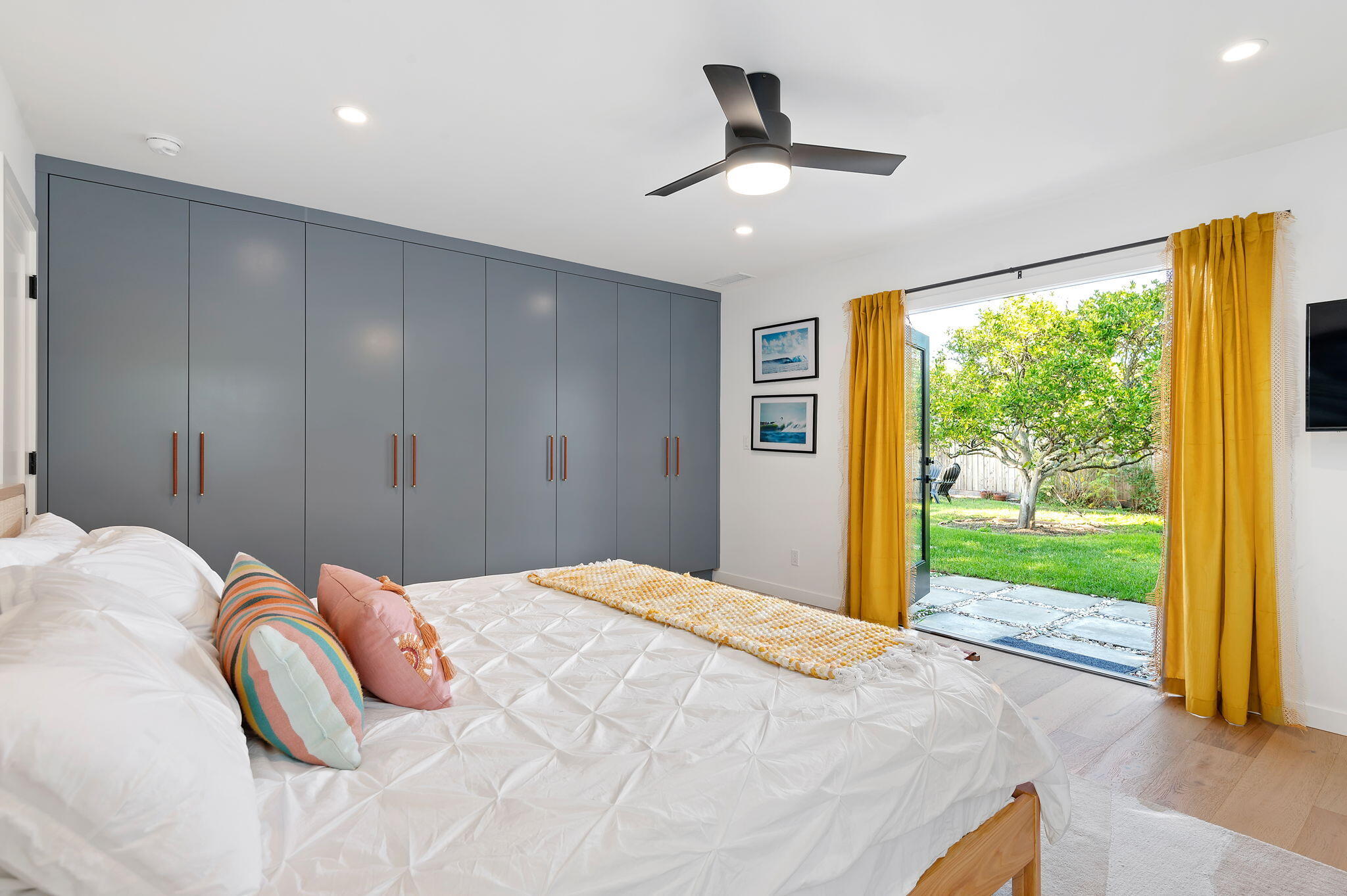 308 Cooper Road Santa Barbara, CA 93109 - Photo 2 of 41 a bed room with a bed and a large window