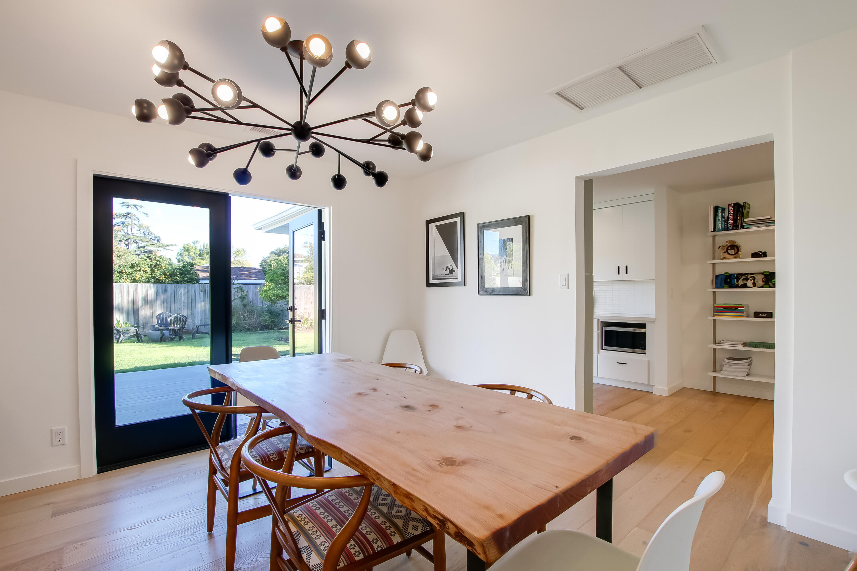 308 Cooper Road Santa Barbara, CA 93109 - Photo 21 of 41 a view of a dining room with furniture window and wooden floor