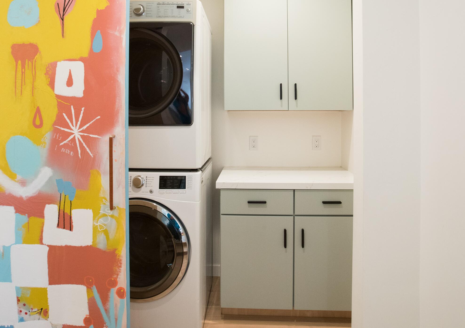 308 Cooper Road Santa Barbara, CA 93109 - Photo 28 of 41 a view of a kitchen with washer and dryer