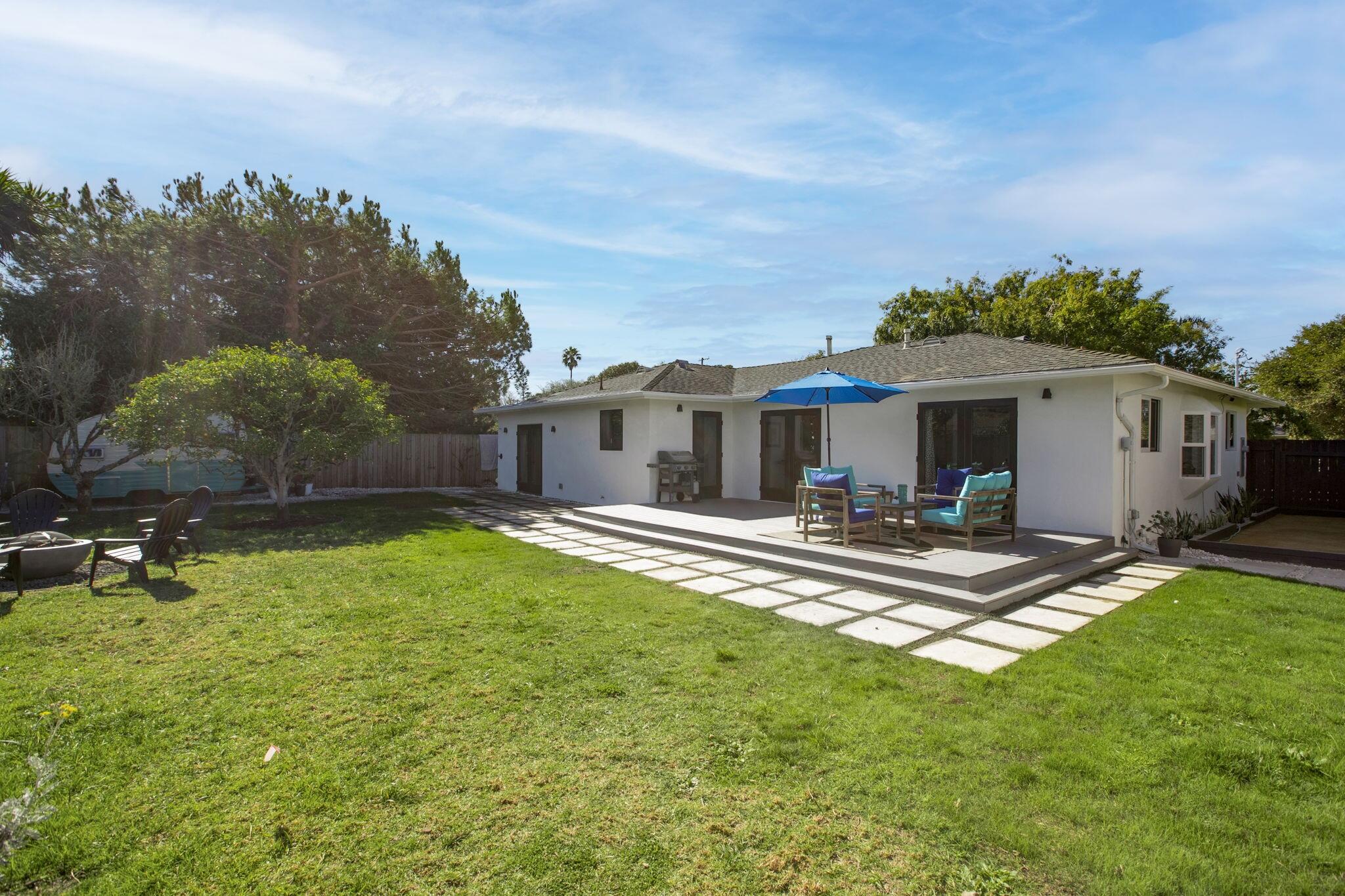 308 Cooper Road Santa Barbara, CA 93109 - Photo 32 of 41 a view of a house with a yard and sitting area