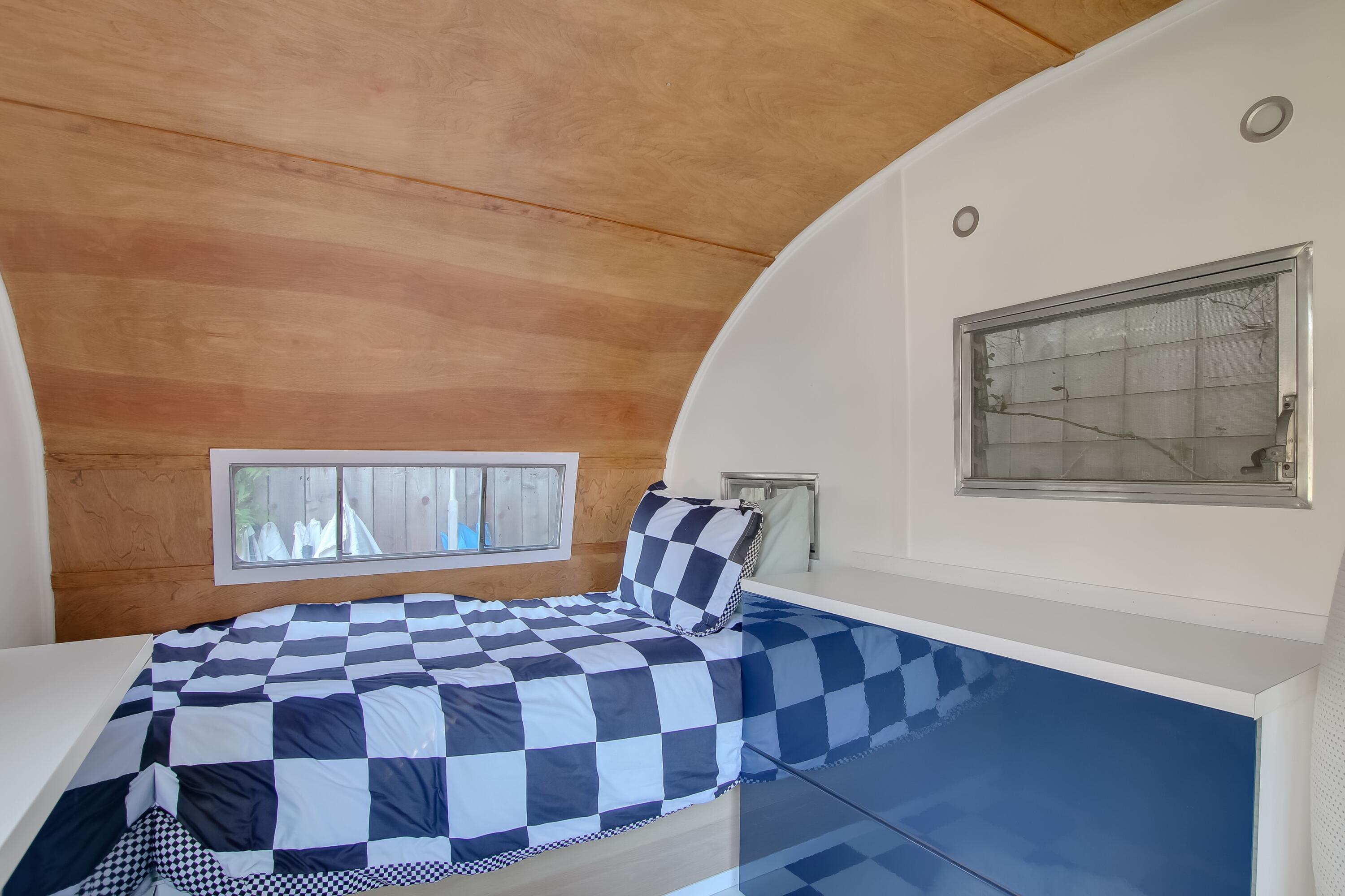 308 Cooper Road Santa Barbara, CA 93109 - Photo 40 of 41 a bedroom with a large bed and a window