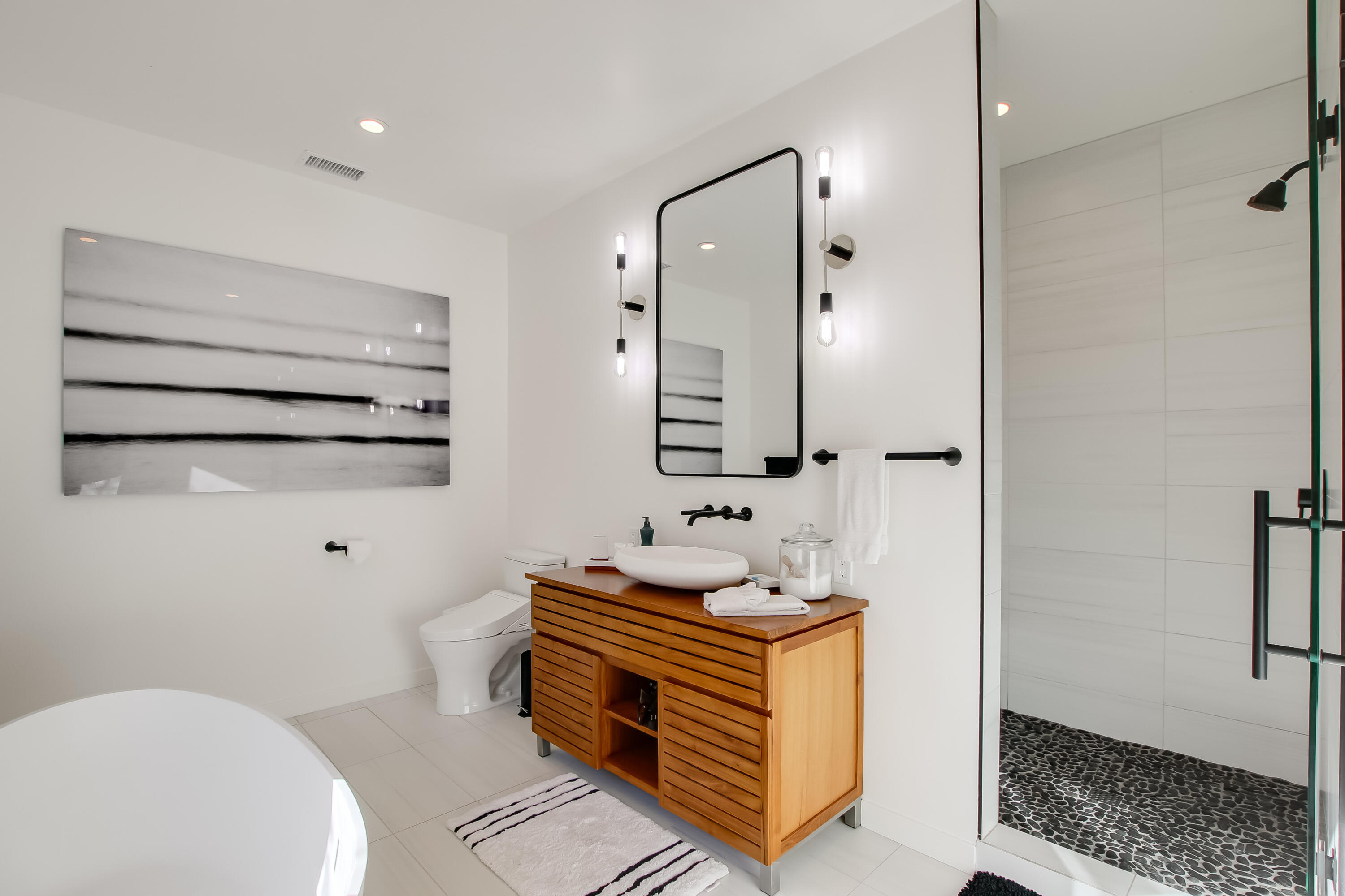 308 Cooper Road Santa Barbara, CA 93109 - Photo 4 of 41 a bathroom with a sink a toilet and shower