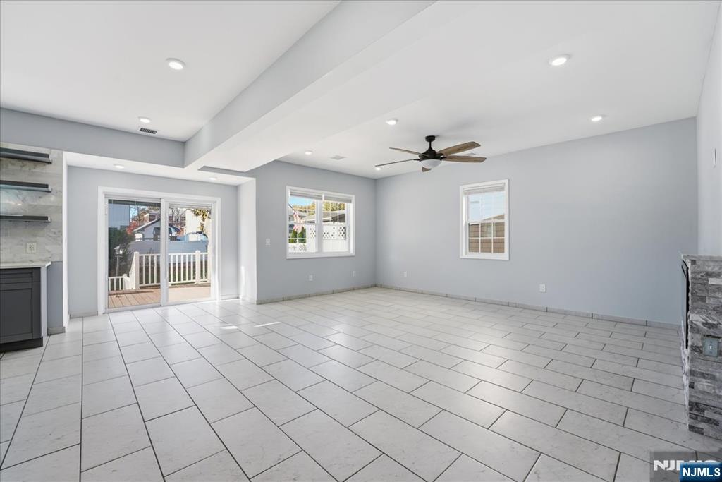 85 Beckwith Place Rutherford, NJ 07070 - Photo 11 of 49 a view of an empty room with a window