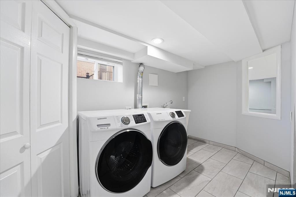 85 Beckwith Place Rutherford, NJ 07070 - Photo 31 of 49 a utility room with dryer and washer