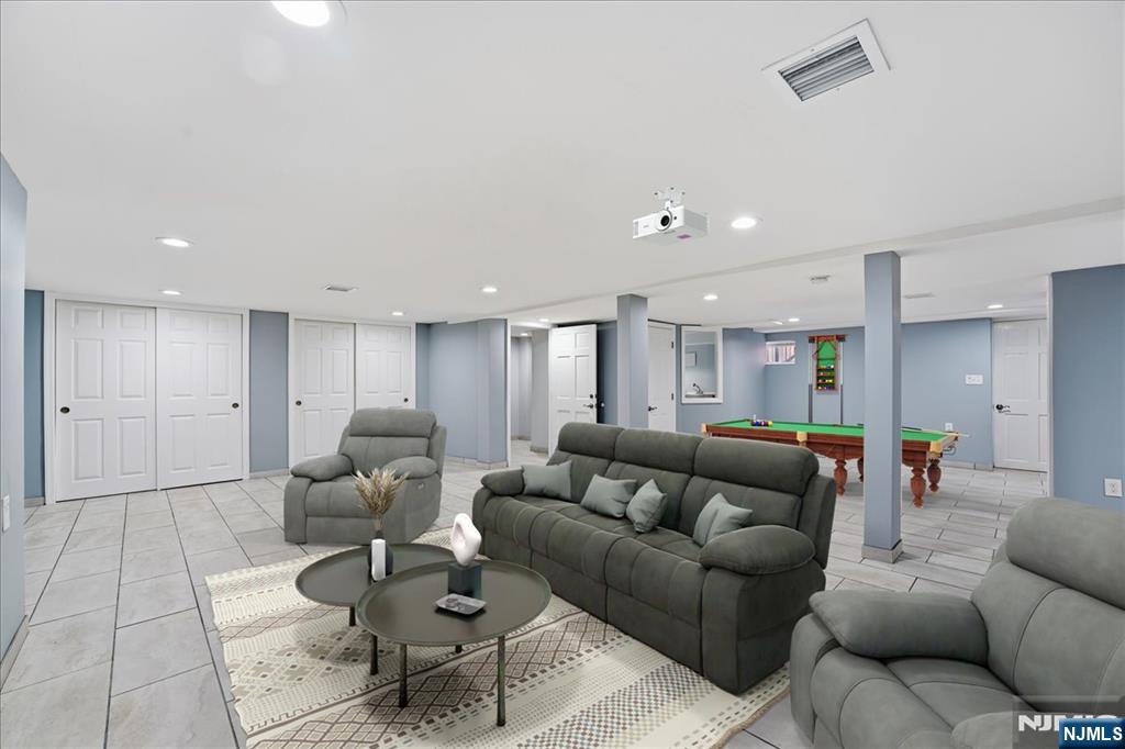 85 Beckwith Place Rutherford, NJ 07070 - Photo 33 of 49 a living room with furniture and kitchen view