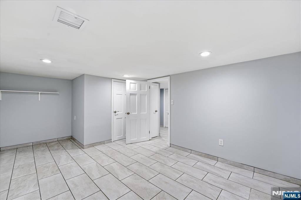 85 Beckwith Place Rutherford, NJ 07070 - Photo 34 of 49 a view of an empty room