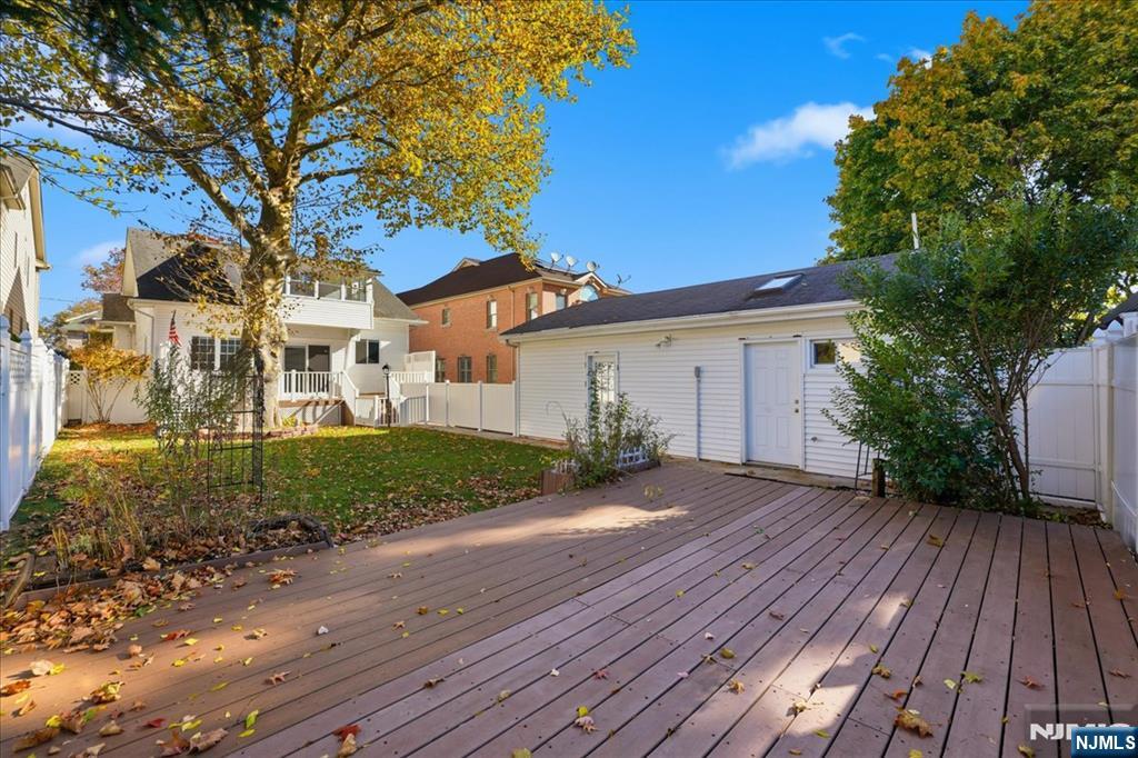 85 Beckwith Place Rutherford, NJ 07070 - Photo 44 of 49 a front view of a house with a yard