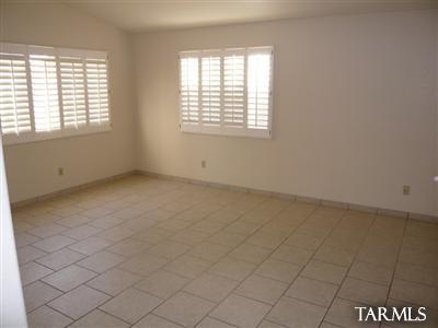 7828 South Lauder Street Tucson, AZ 85747 - Photo 7 of 11 an empty room with windows