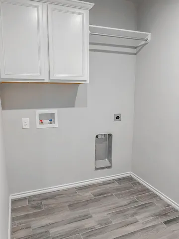 a view of a livingroom with wooden floor