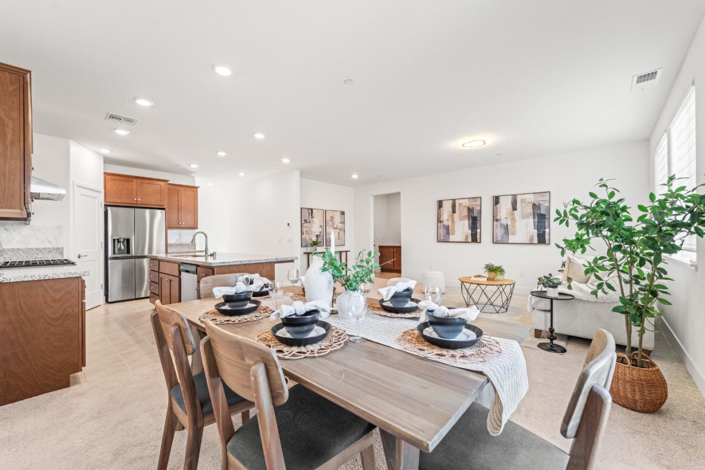 384 Ramos Ranch Road Oakley, CA 94561 - Photo 3 of 39 a dining room with furniture potted plants and wooden floor