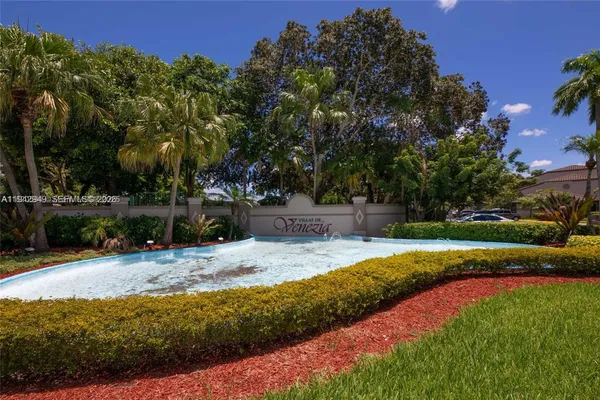 a view of a backyard with green space