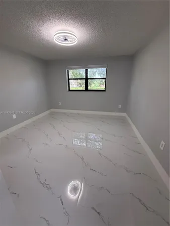 a bathroom with a sink a toilet and a bathtub