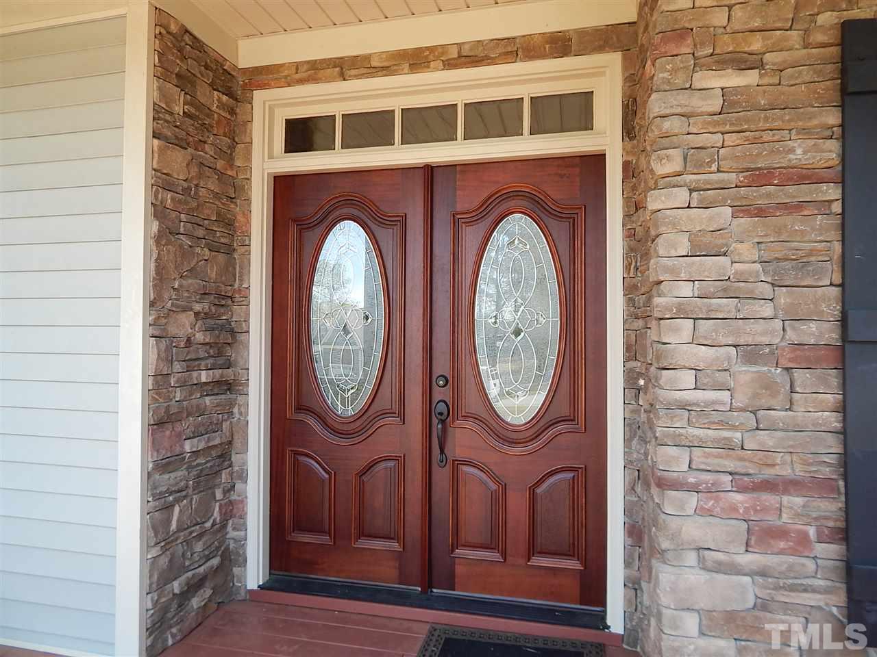 32 North Sunset Ridge Drive Willow Spring, NC 27592 - Photo 2 of 25 a view of a door with a utility room