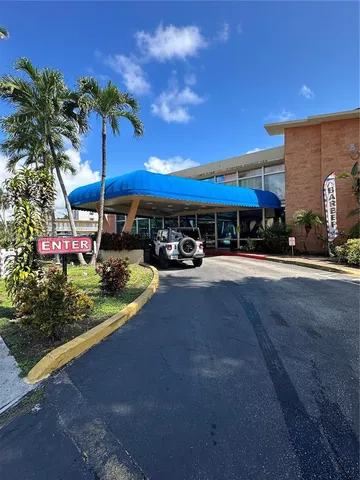 a view of a chairs and tables in the patio