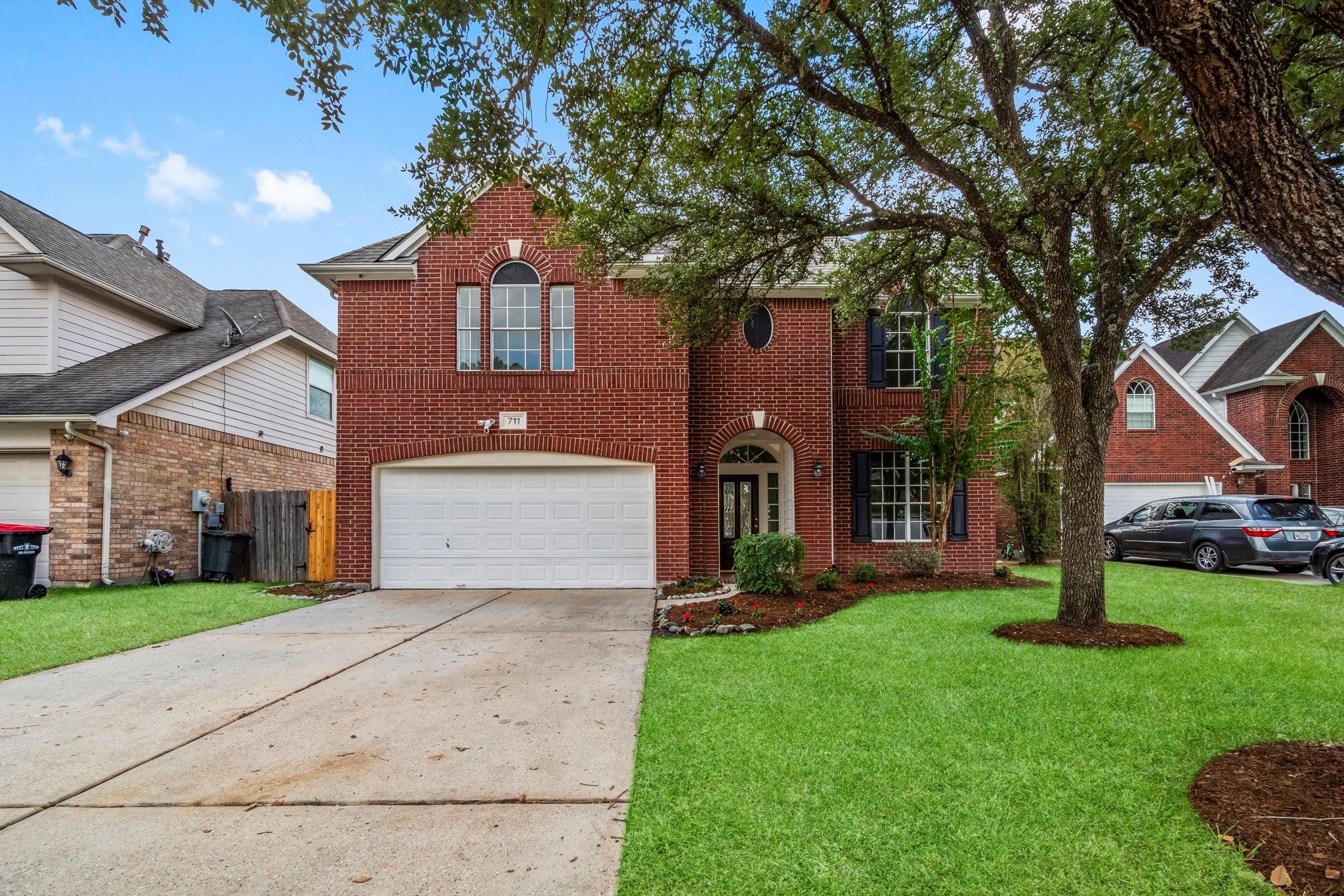 front view of house with a yard