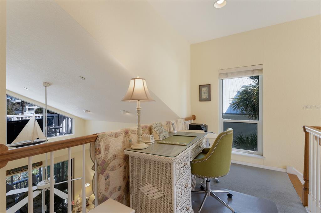 815 South Harbor Drive Boca Grande, FL 33921 - Photo 13 of 74 a view of a dining room with furniture and a window