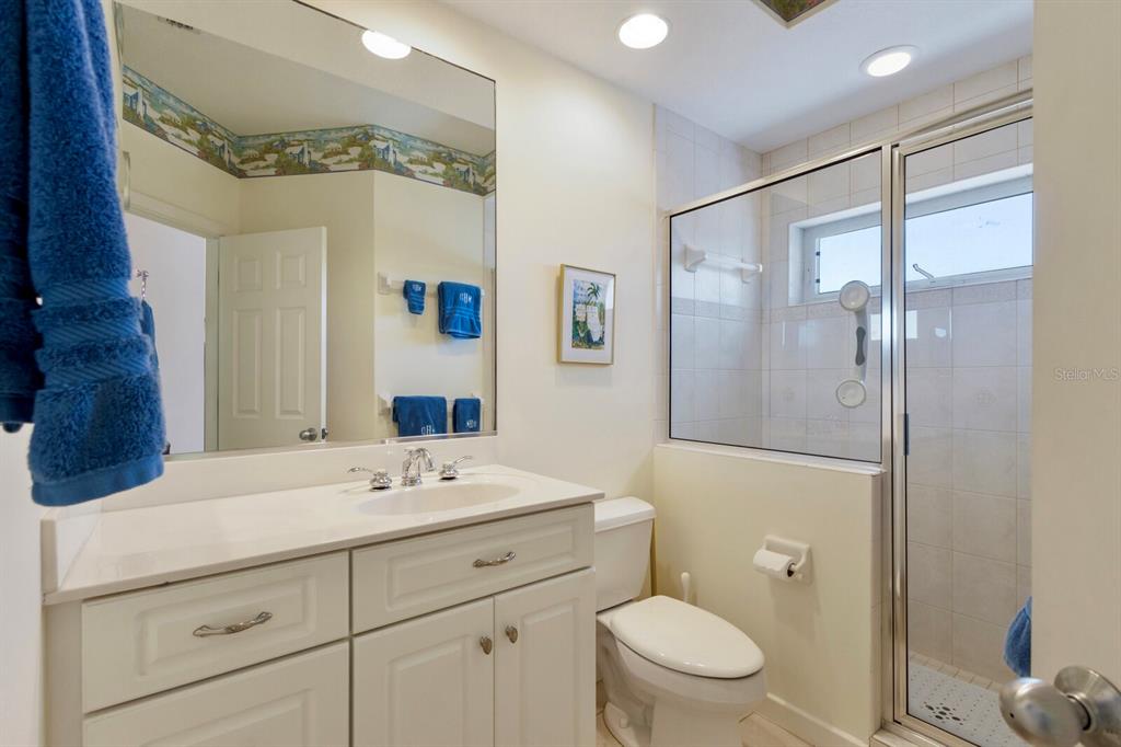 815 South Harbor Drive Boca Grande, FL 33921 - Photo 15 of 74 a bathroom with a sink a toilet and shower