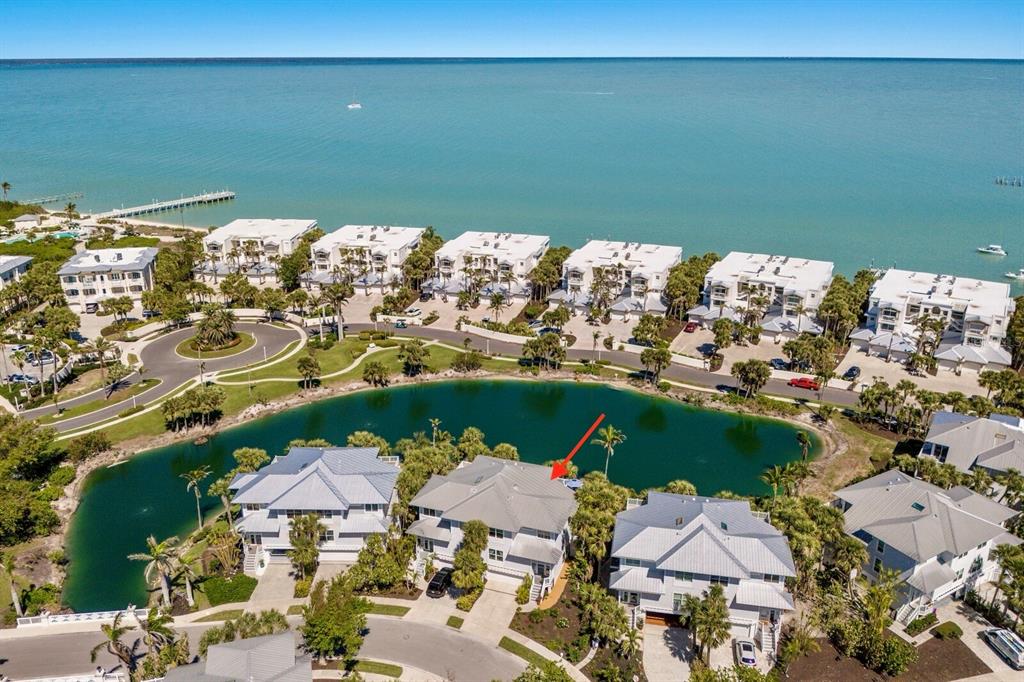 815 South Harbor Drive Boca Grande, FL 33921 - Photo 27 of 74 an aerial view of a house with a lake view