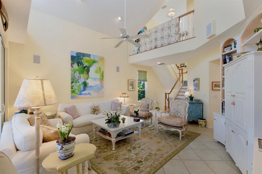 815 South Harbor Drive Boca Grande, FL 33921 - Photo 3 of 74 a living room with furniture and a chandelier