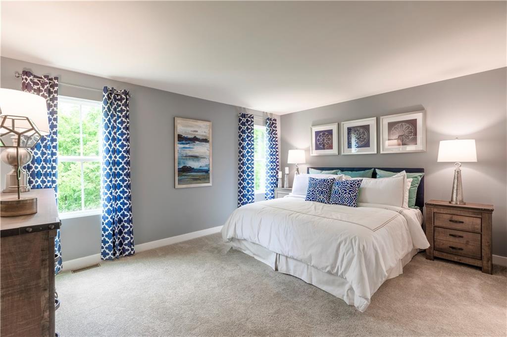 844 Ashley Road Gibsonia, PA 15044 - Photo 12 of 16 a bedroom with a bed and a window