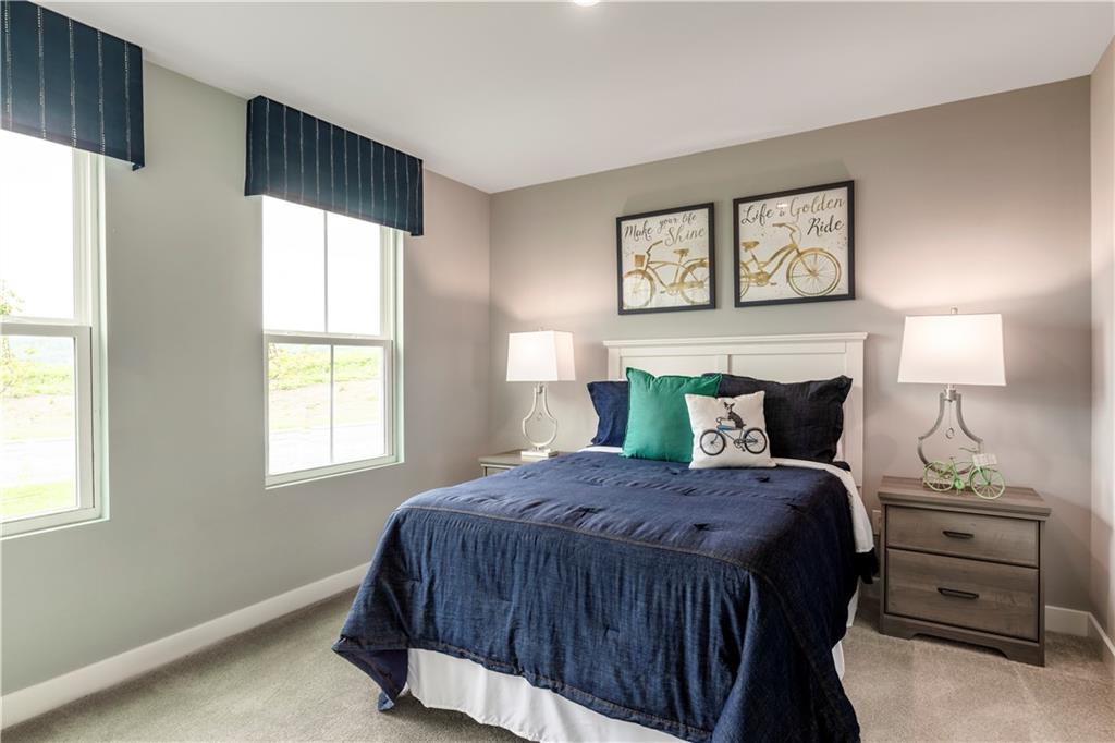 844 Ashley Road Gibsonia, PA 15044 - Photo 15 of 16 a bedroom with a bed and a window