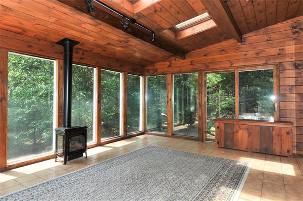 138 Rattlesnake Hill Road Andover, MA 01810 - Photo 5 of 17 a view of a room with wooden floor and iron stairs
