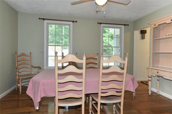 138 Rattlesnake Hill Road Andover, MA 01810 - Photo 7 of 17 a view of a dining room with furniture and chandelier