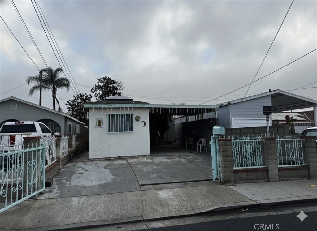 8217 Howe Street Paramount, CA 90723 - Photo 1 of 1 a view of a house with a garage