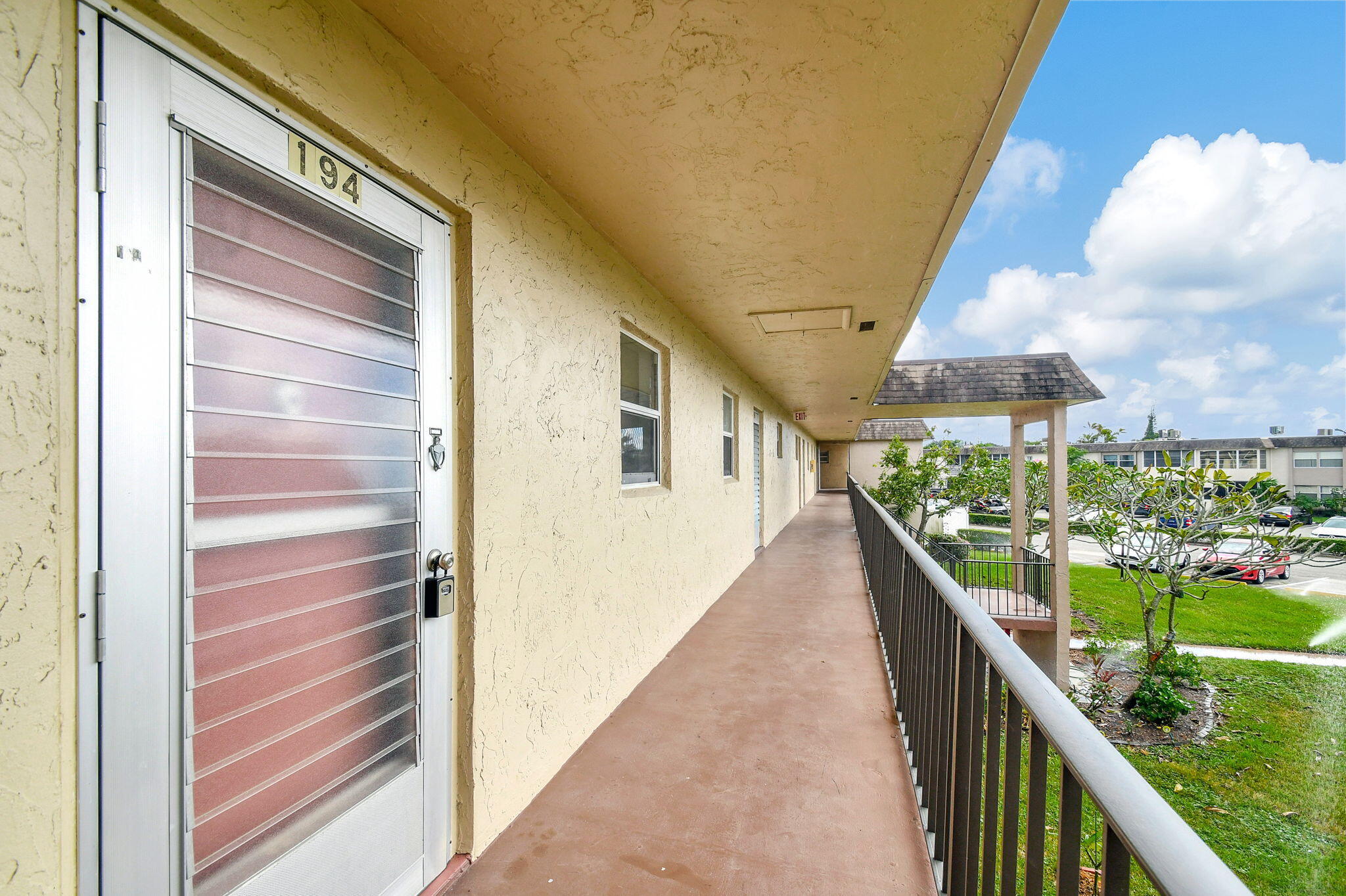 702 Lori Drive, Unit 194 Palm Springs, FL 33461 - Photo 21 of 41 a view of balcony with furniture