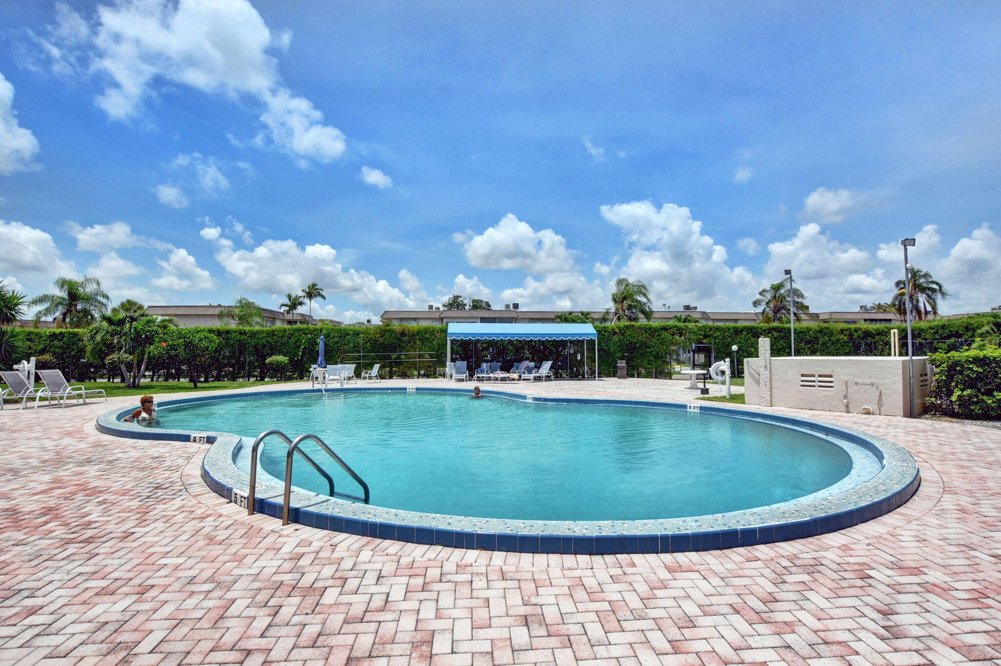 702 Lori Drive, Unit 194 Palm Springs, FL 33461 - Photo 30 of 41 a view of a swimming pool with outdoor space