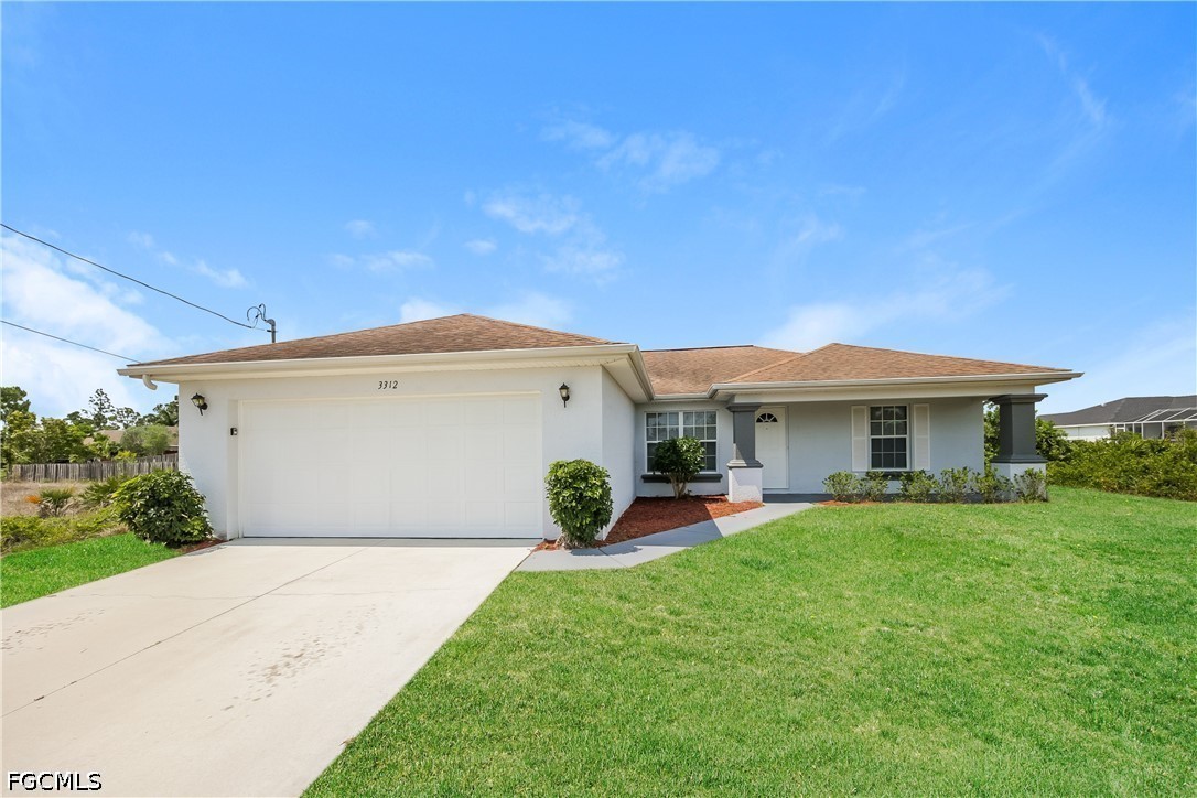 3312 38th Street Southwest Lehigh Acres, FL 33976 - Photo 1 of 15